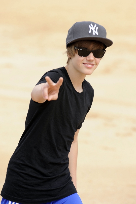 justin bieber on the beach. One Time singer Justin Bieber